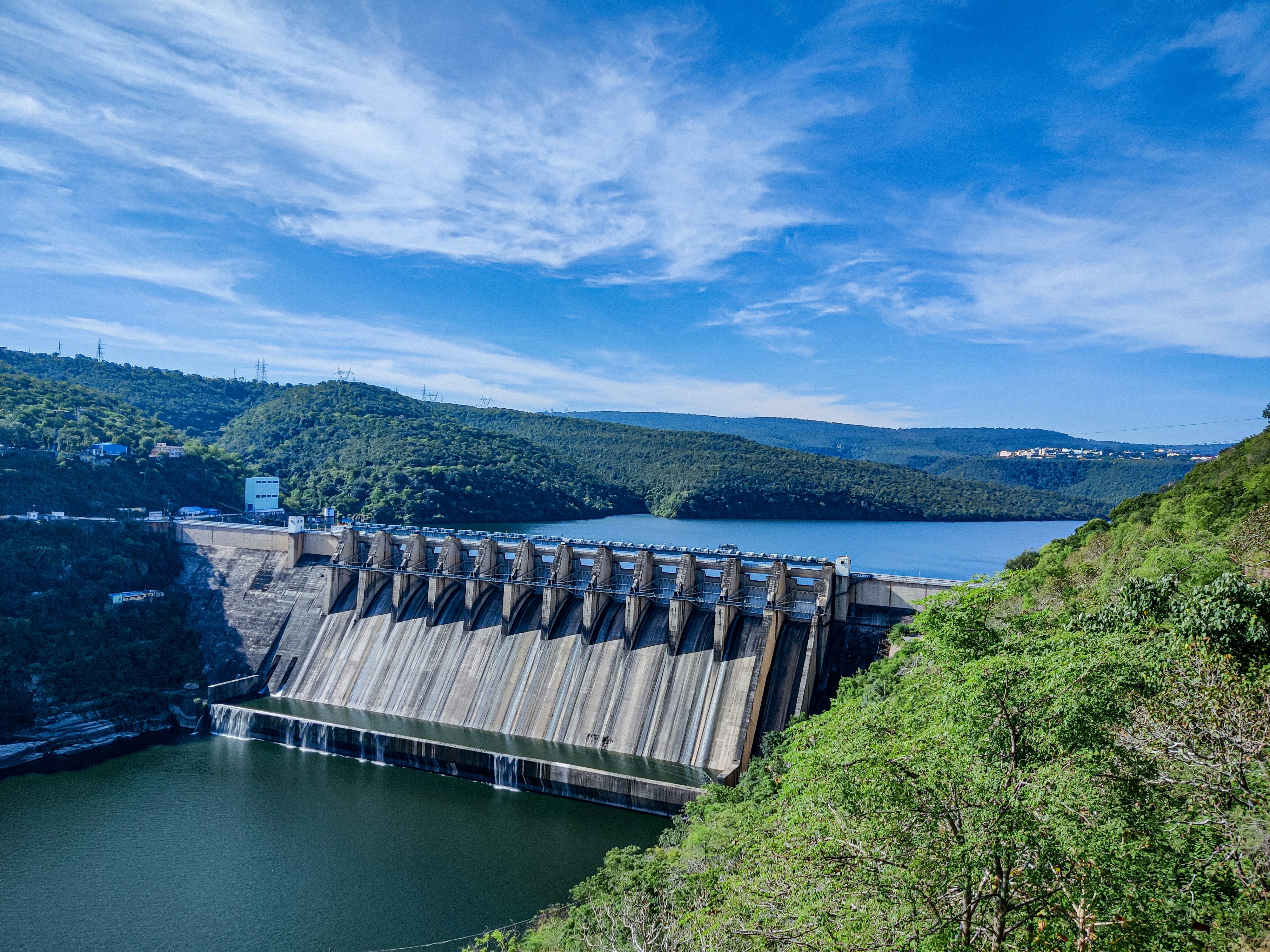 https://unsplash.com/photos/gray-concrete-dam-under-blue-sky-during-daytime-o8iXJVAahUc?utm_source=unsplash&utm_medium=referral&utm_content=creditShareLink